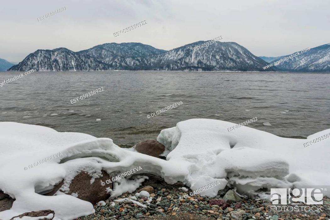 Stock Photo: unfrozen Lake Teletskoye in winter. Russia Altai Krai.