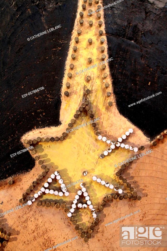 Stock Photo: Star composed of nails. Lettering: Peace. Church of the Trinity. Les Contamines-Montjoie. Haute-Savoie. Auvergne Rhône-Alpes. France. Europe.