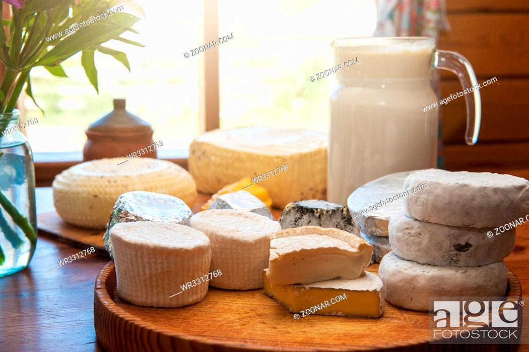 Stock Photo: Set of different cheese: camembert, croton, mozzarella, smoked mozzarella and other.