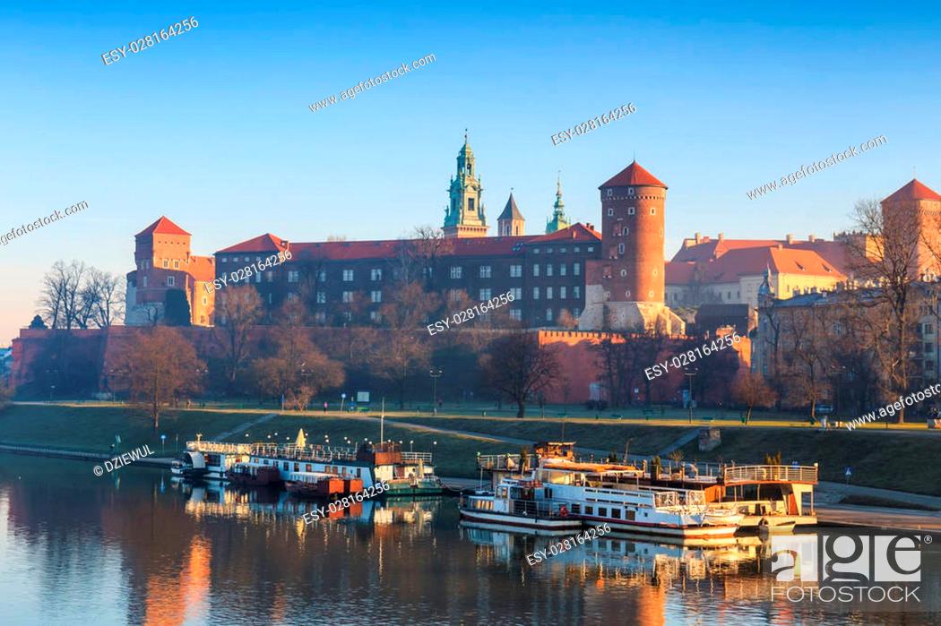 Stock Photo: sunrise over the historic royal Wawel Castle in Cracow, Poland.