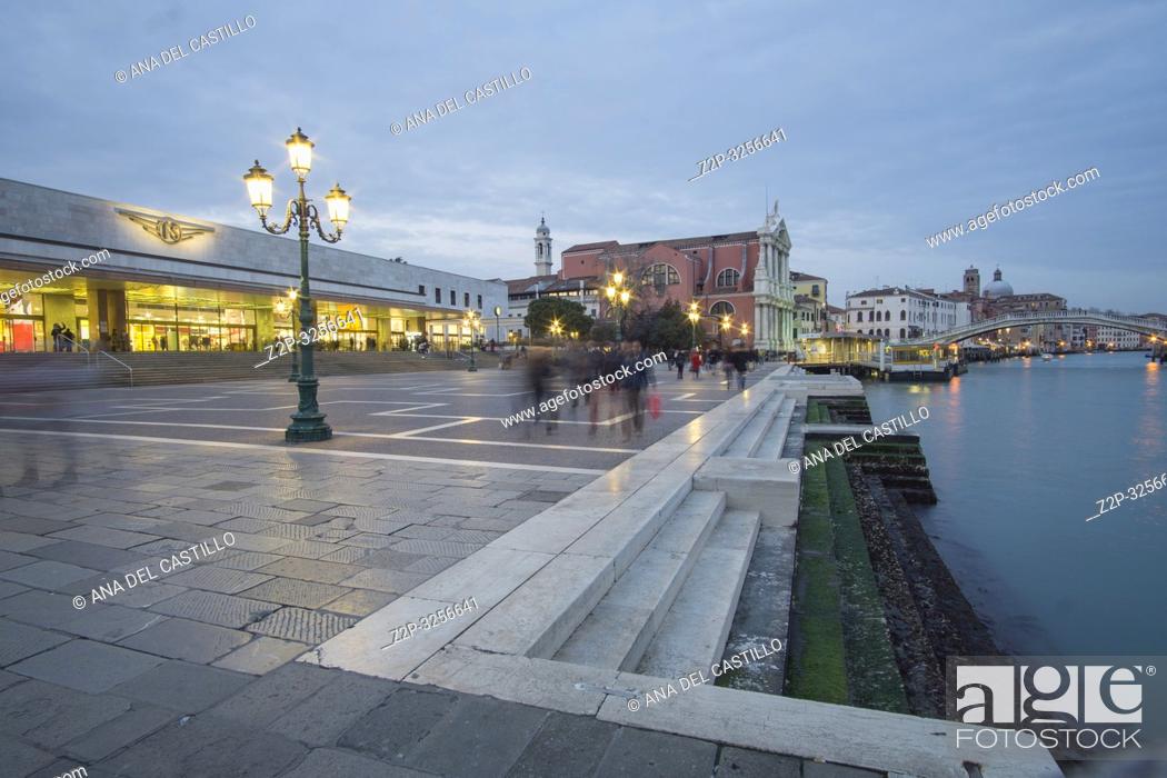 Stock Photo: Venice, Veneto, Italy: Twilight in Grand Canal. Santa Lucia station with tourists departing and arriving.