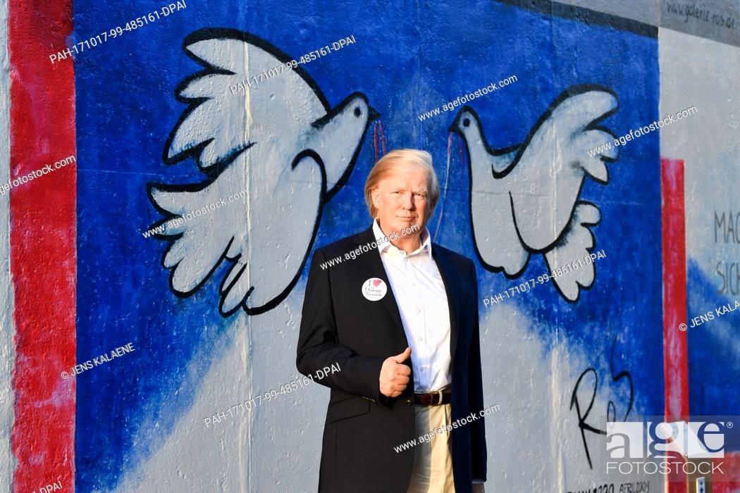Stock Photo: EXCLUSIVE - The wax figure of USÂ president Donald TRump can be seen at the East Side Gallery along the remains of the wall in Berlin, Germany, 17 October 2017.