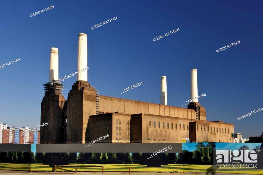 Stock Photo: England, London, Battersea, A view toward Battersea Power Station. It was designed by Sir Giles Gilbert Scott in 1930 and completed in 1955.