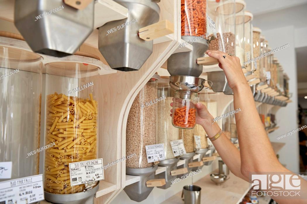 Stock Photo: Close-up of woman shopping in packaging-free supermarket.