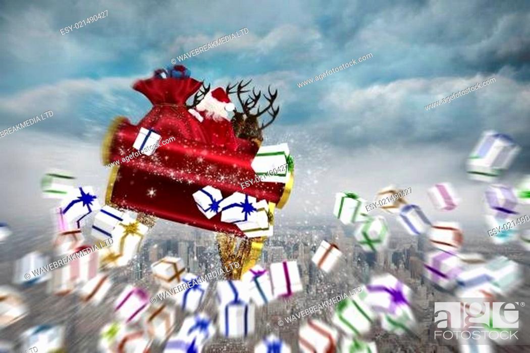 Stock Photo: Composite image of white christmas presents with ribbon.