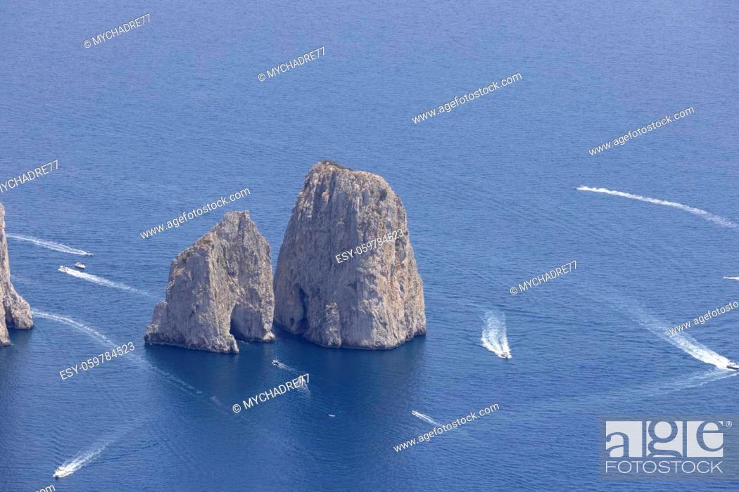 Stock Photo: Faraglioni, attractive coastal rock formation eroded by waves, located off the coast of the island of Capri in the Gulf of Naples, Capri, Italy.