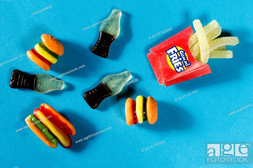 Stock Photo: An array of festive summer holiday inspired Gummie candies, from coca-cola bottles to french fries.