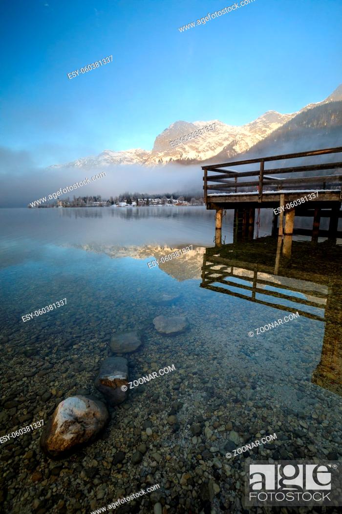 Stock Photo: Wooden pier on Lake Grundlsee in Austria during Winter.