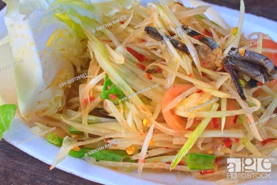Stock Photo: Green papaya salad Thai cuisine spicy delicious.