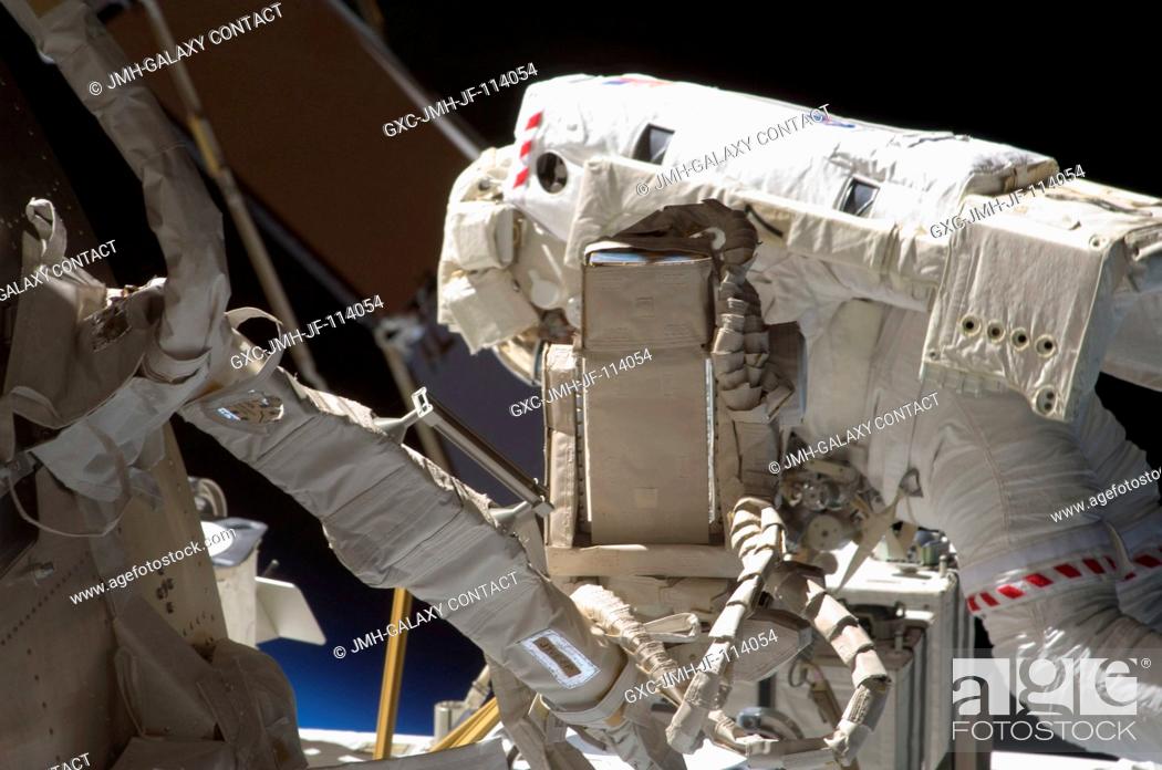 Stock Photo: Astronaut Christopher Cassidy, STS-127 mission specialist, participates in the mission's fifth and final session of extravehicular activity (EVA) as.