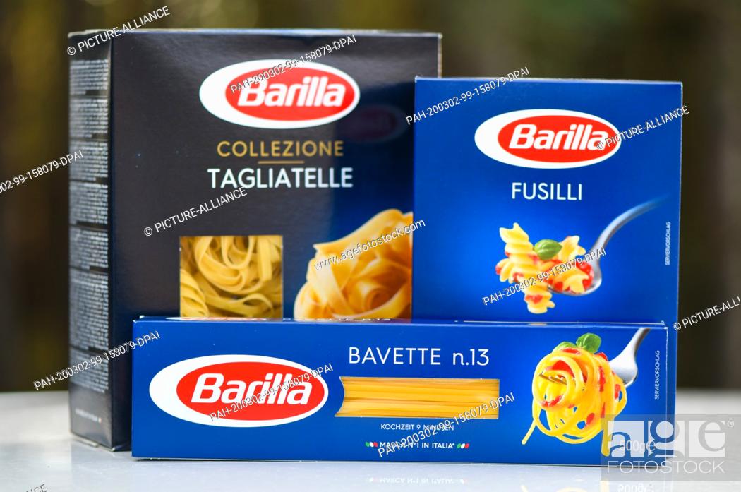 Stock Photo: 02 March 2020, Brandenburg, Grünheide: ILLUSTRATION - Various products of the Barilla brand are placed on a table (posed shot).