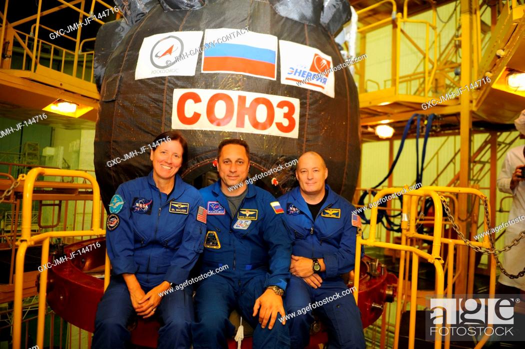 Stock Photo: At the Baikonur Cosmodrome in Kazakhstan, the Expedition 53-54 backup crewmembers pose for pictures in from of the Soyuz MS-06 spacecraft during pre-launch.