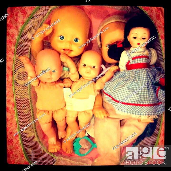 Stock Photo: Her play babies.