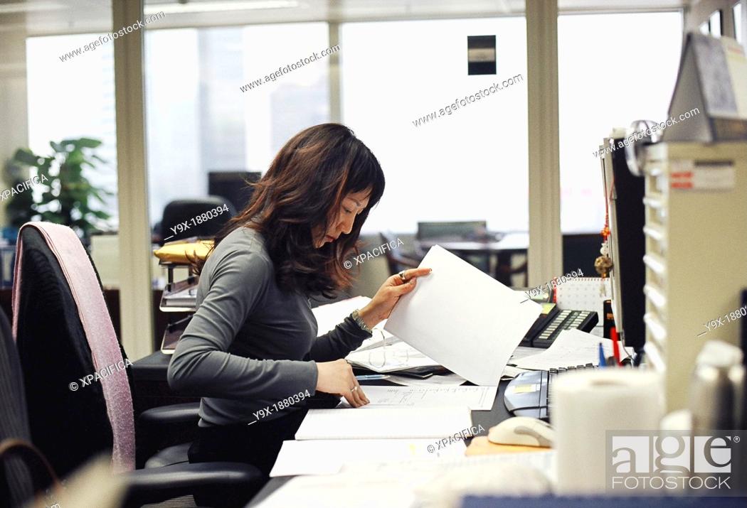 Stock Photo: Workers in the office of Credit Suisse First Boston CSFB, a leading stockbroker and investment bank.
