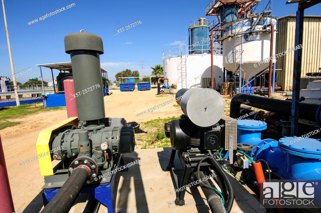 Stock Photo: water pumps at the Sewerage treatment facility. The treated water is then used for irrigation and agricultural use. Photographed near Hadera, Israel.
