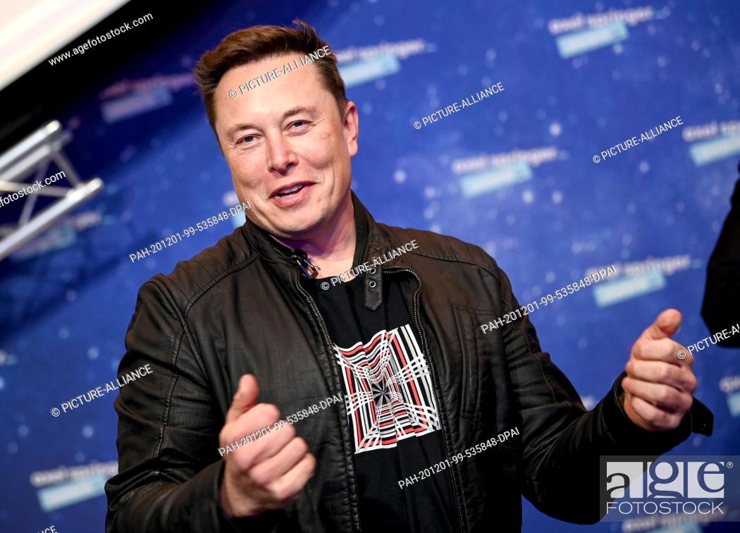 Stock Photo: 01 December 2020, Berlin: Elon Musk, head of the space company SpaceX and Tesla CEO, comes to the Axel Springer Award ceremony.