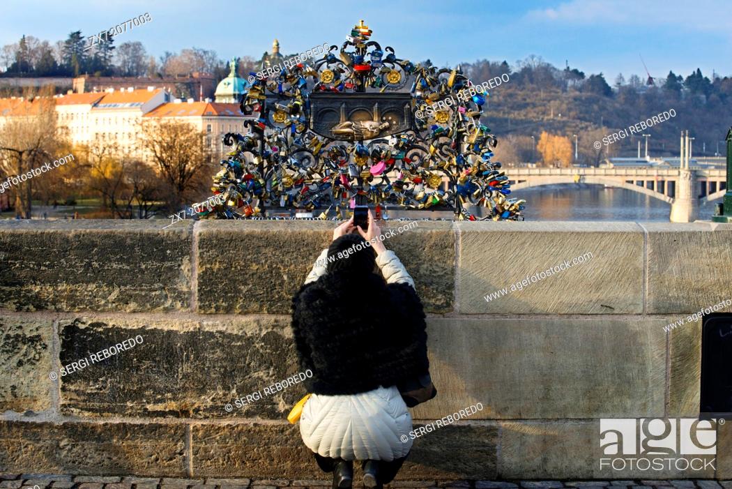 Stock Photo: Padlocks on the Charles Bridge . Charles Bridge will never cease to fascinate painters, photographers and poets who flatter him in his works.