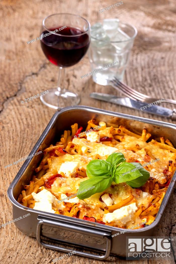Stock Photo: italian pasta with cheese and basil.