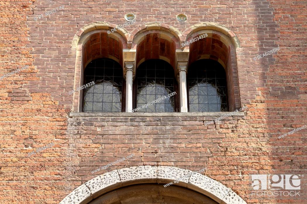 Stock Photo: Mullioned window on a wall of the Basilica of San Teodoro, Pavia, Lombardy, Italy, 12th century. Detail.