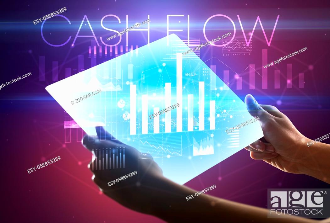 Stock Photo: Hand holding futuristic tablet with CASH FLOW inscription above, modern business concept.