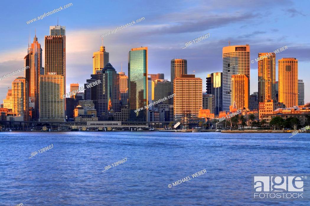 Stock Photo: View of Sydney Cove at sunrise, Circular Quay, port, Sydney skyline, Central Business District, Sydney, New South Wales, Australia.