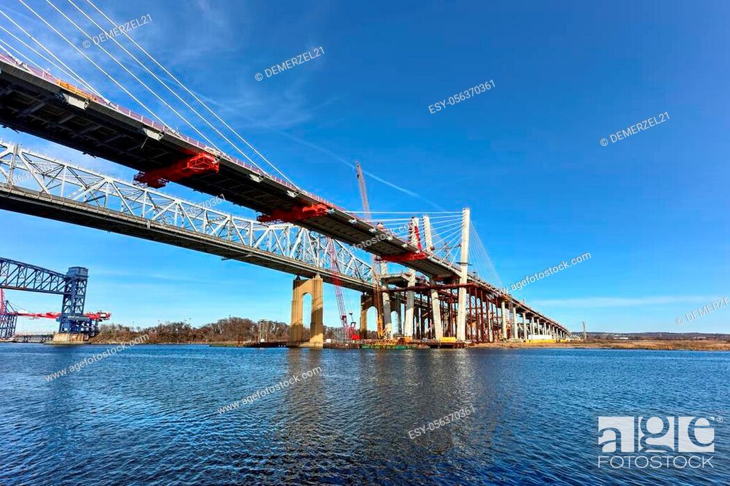 Stock Photo: The old and new Goethals Bridge. The Goethals Bridge connects Elizabeth, NJ to Staten Island, NY over the Arthur Kill.