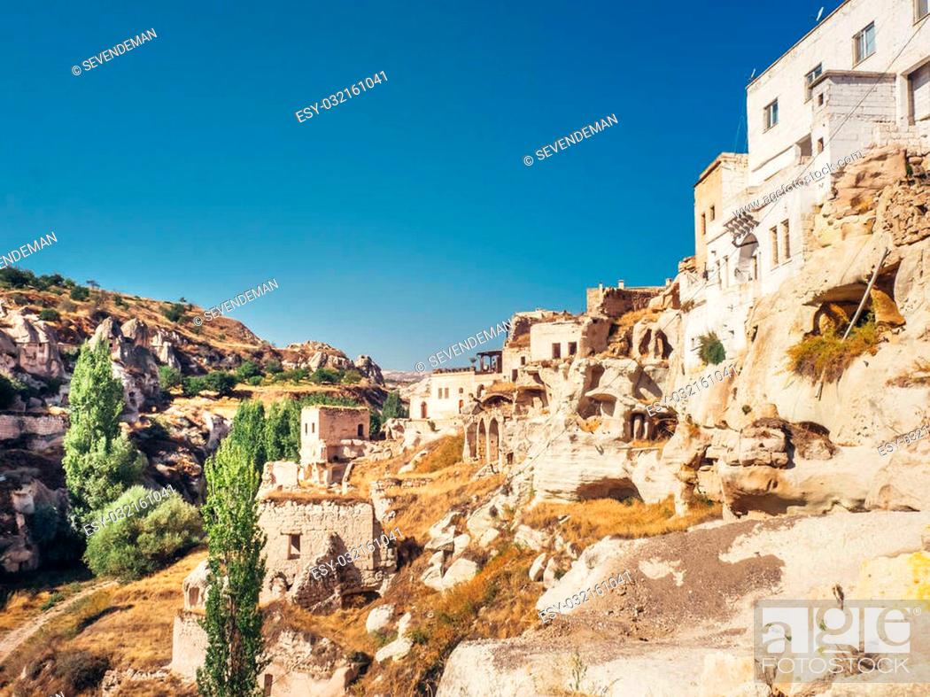 Stock Photo: Ortahisar, Nevsehir, Turkey - September 16, 2016: Famouse rock town that build into the cave of sandstone.