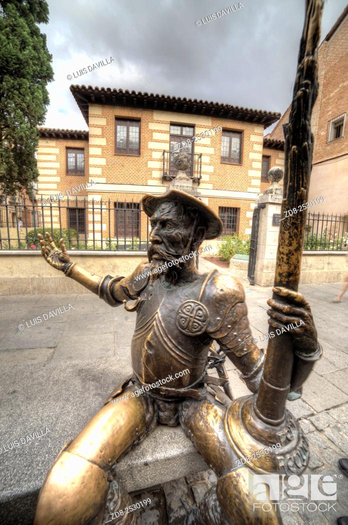 Stock Photo: El quijote statue in front of Cervantes birth house-museum. alcala de henares. Spain. It is a monographic museum placed in Calle Mayor.