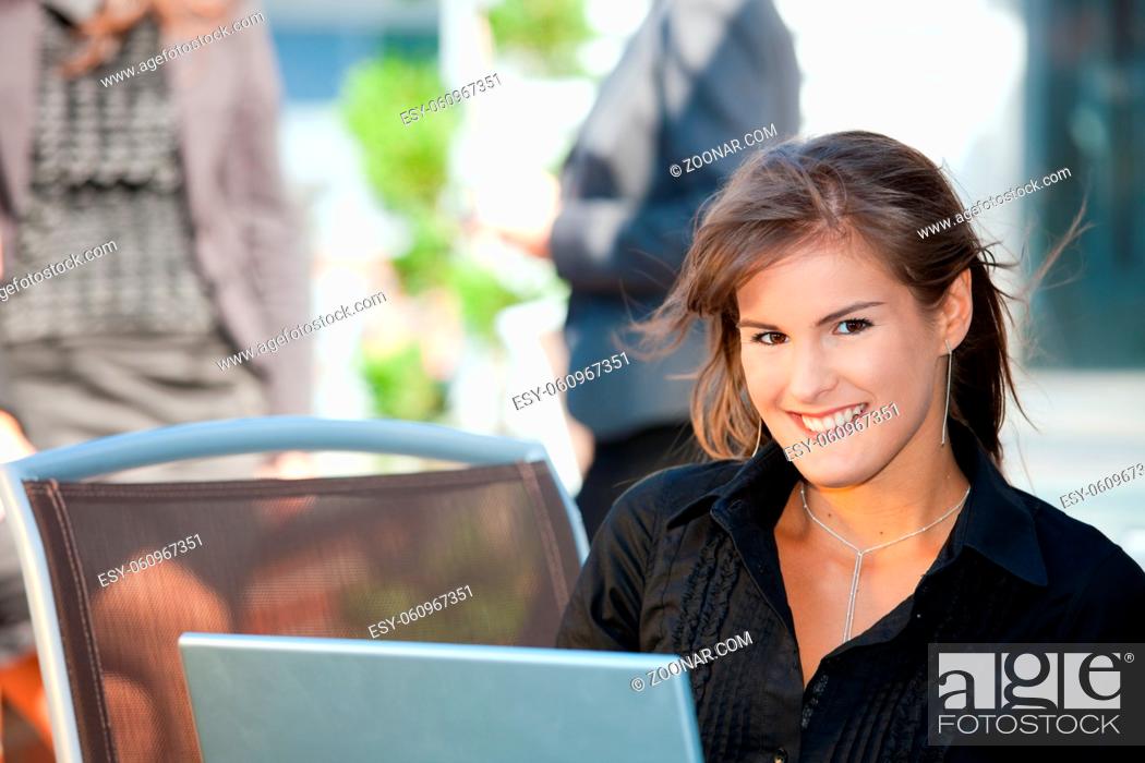 Stock Photo: Closeup portrait of happy young businesswoman, smiling.