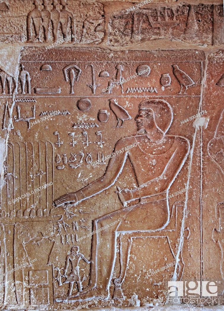 Stock Photo: Saqqara, Cairo, Egypt: pyramid of king Unas (2380-2350 b.Chr.) A false door with the seated pharaoh.