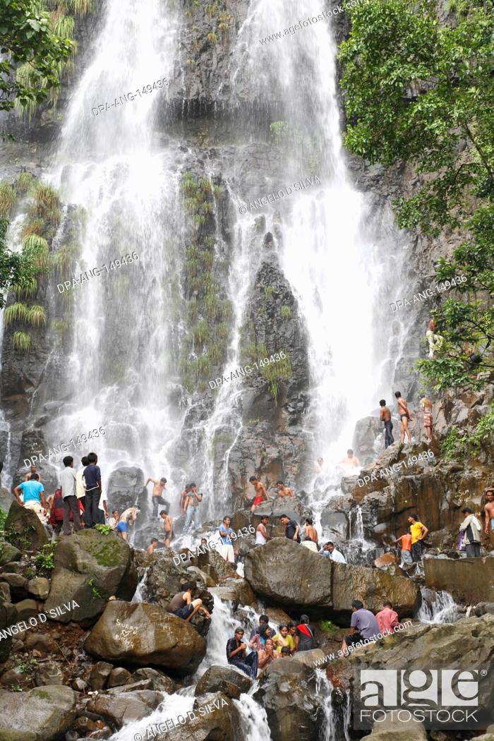 Stock Photo: Popular waterfall of Amboli Ghat tourist bathing ; Sawantwadi to Amboli Hill station ; Maharashtra ; India.