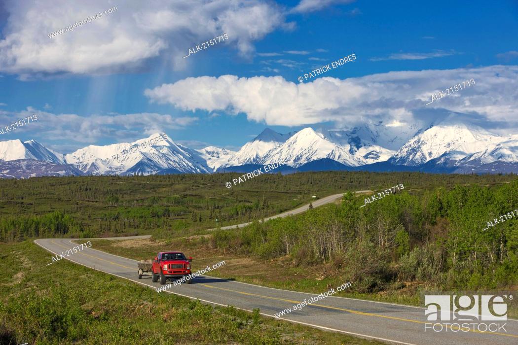 Stock Photo: Scenic View Of A Truck Travelling On The Richardson Highway With The Alaska Range In The Background, Alaska.
