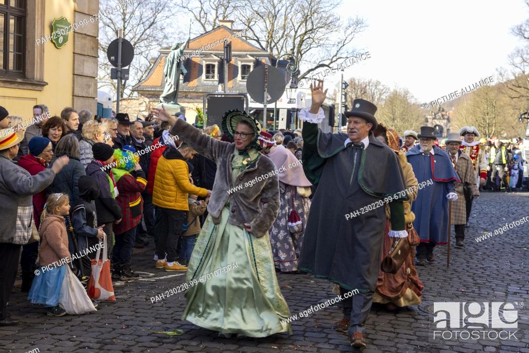 Stock Photo: 20 February 2023, Hesse, Fulda: In historical costumes, fools take part in Hesse's largest carnival parade in Fulda. Under the motto ""Fölsch Foll hinein.