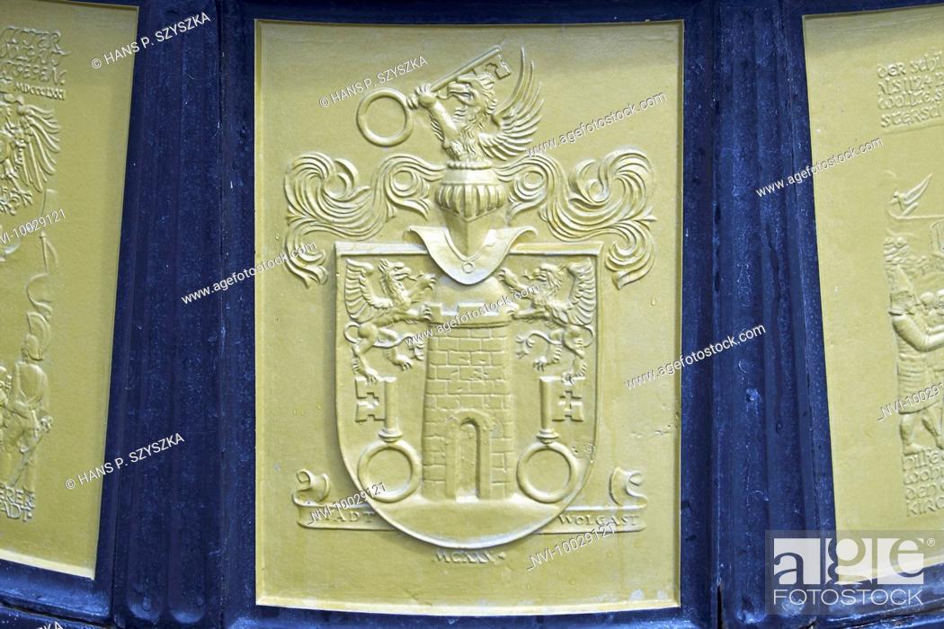 Stock Photo: Coat of arms of Wolgast at the fountain in front of the Town Hall, Wolgast, Mecklenburg-Western Pomerania, Germany.