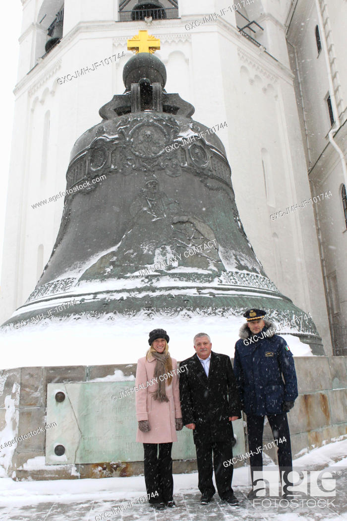 Stock Photo: The Expedition 34 backup crew members pose for pictures in front of the Tsar Bell at the Kremlin in Moscow Nov. 29, 2012 during ceremonial activities that.