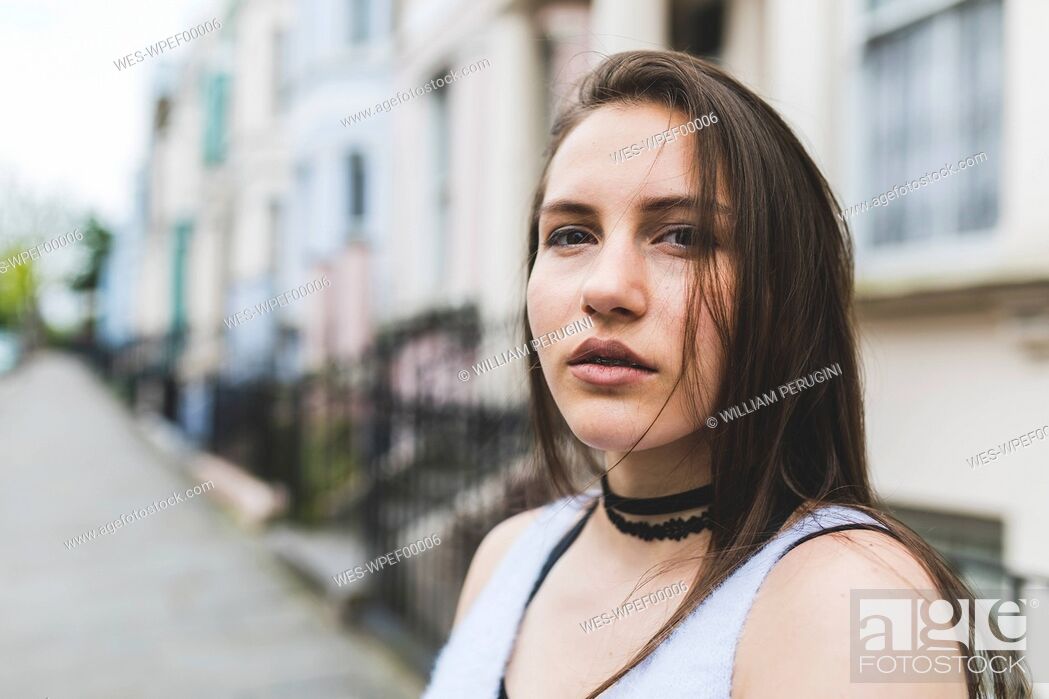 Stock Photo: Portrait of teenage girl in the city.