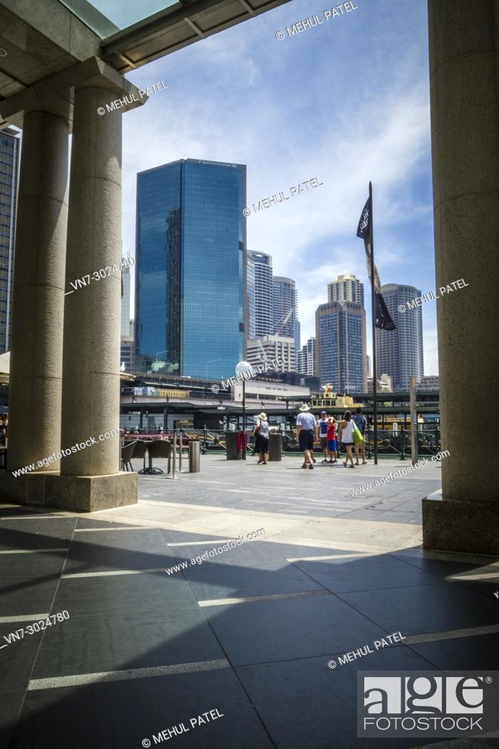 Stock Photo: View of high rise buildings sitting above the transport terminals of Circular Quay, Sydney Harbour, Sydney, NSW, Australia.