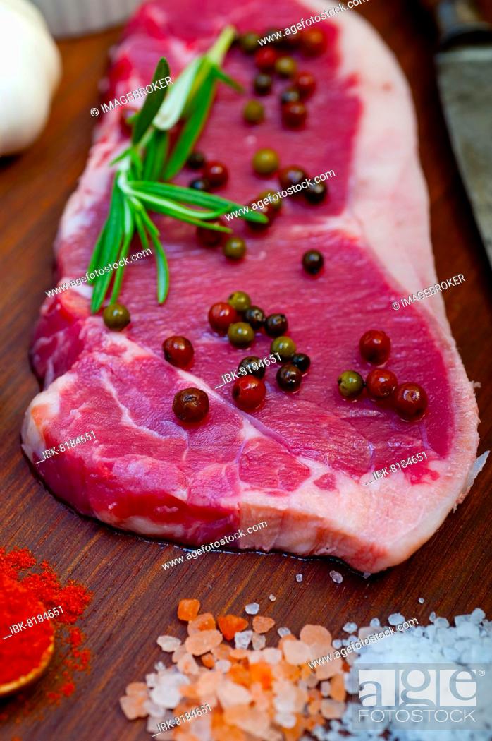 Stock Photo: Raw uncooked ribeye beef steak butcher selection.