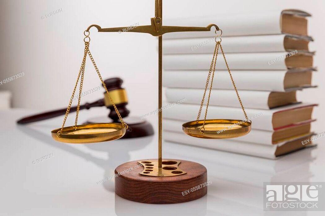 Stock Photo: Wooden gavel with justice scales and open book, isolated on white.