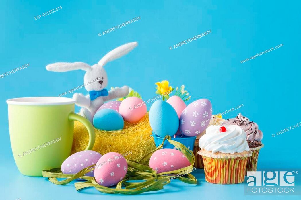 Photo de stock: Colorful decoration of kids birthday party table with easer eggs and sweets.