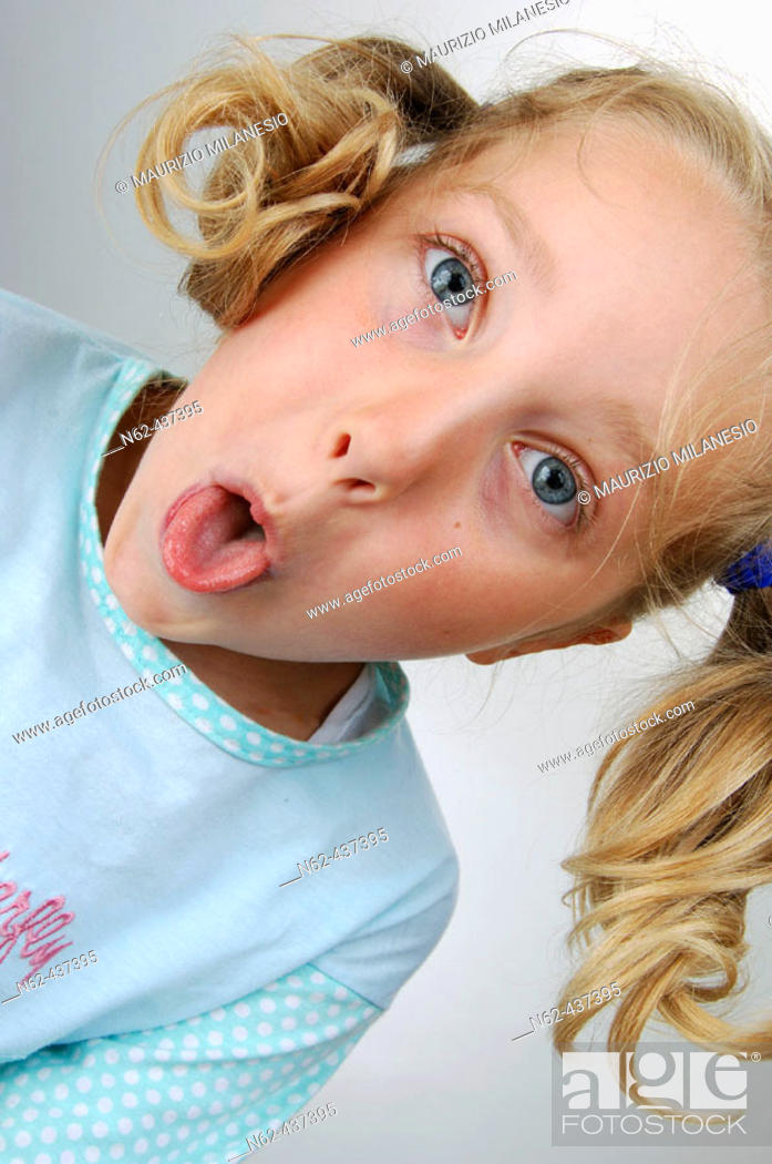 Little girl with pigtails bottom view makes some funny faces, Stock Photo,  Picture And Rights Managed Image. Pic. N62-437395 | agefotostock