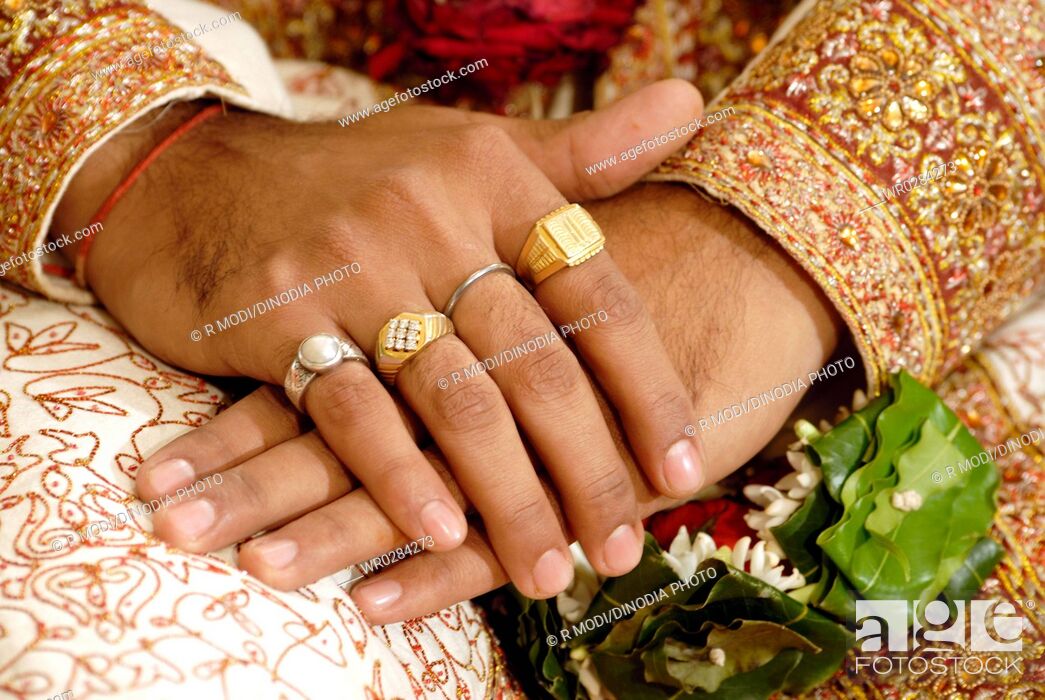 Indian Wedding Couple Looking At Rings Stock Photo - Download Image Now -  Bride, India, Indian Ethnicity - iStock