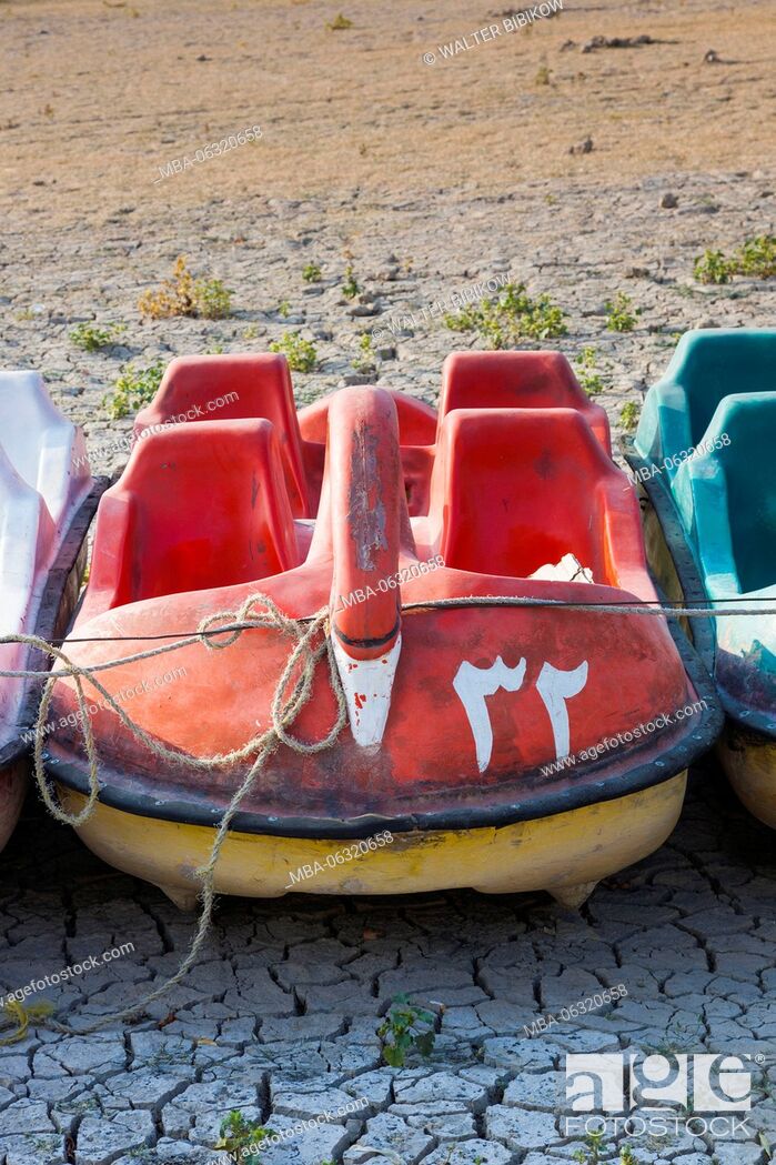 Stock Photo: Iran, Central Iran, Esfahan, swan boats on dried out riverbed of the Zayandeh River.
