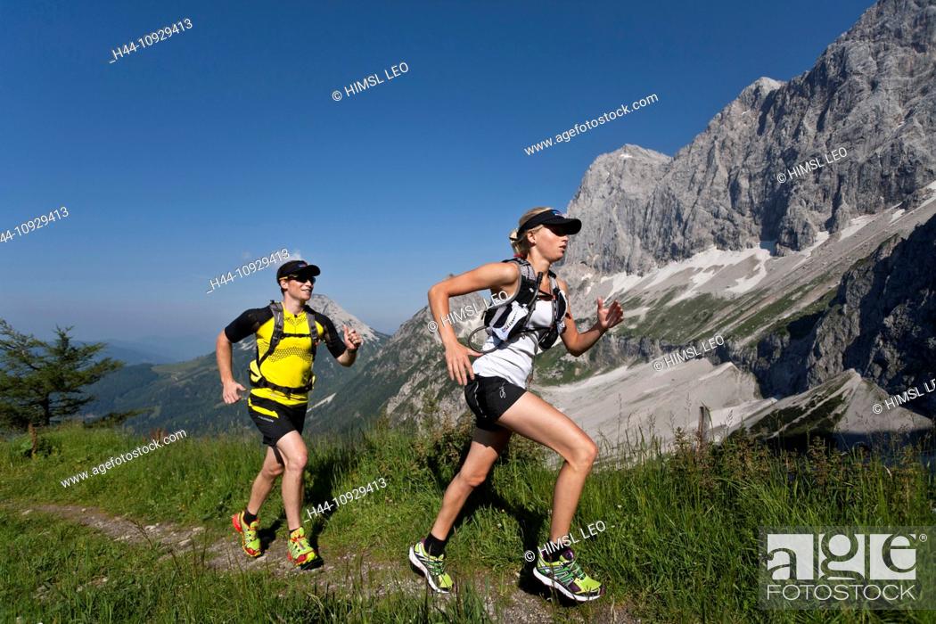 Stock Photo: Trailrunning, Trail running, Trail, Ramsau, Dachstein, Styria, Austria, couple, woman, man, meadow, running, walking, run, mountains, mountain run, jogging.