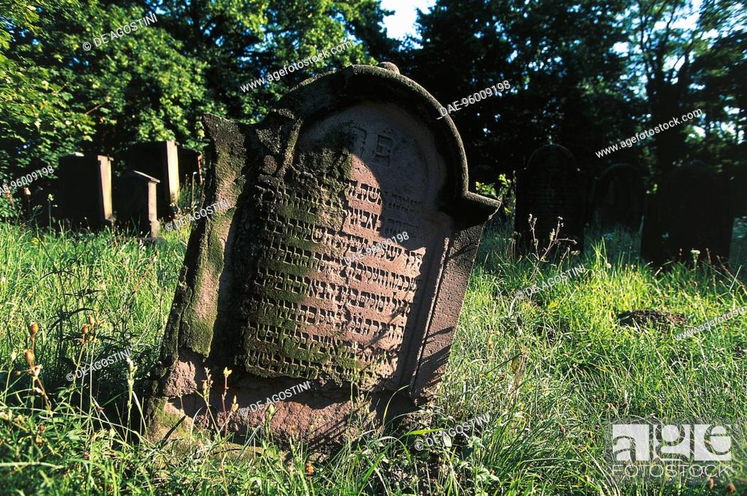 Stock Photo: A tombstone in the Jewish Cemetery (Judenfriedhof) of Worms, the oldest surviving and largest Jewish cemetery in Europe, Rhineland-Palatinate, Germany.