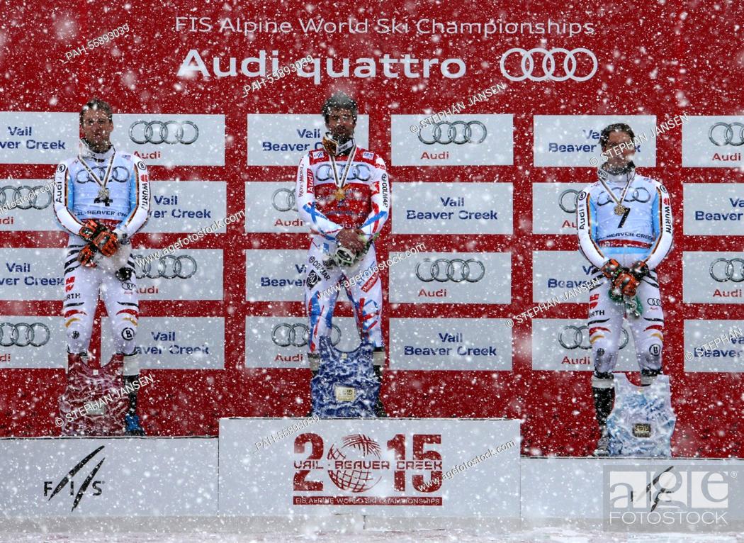 Stock Photo: Fritz Dopfer of Germany (silver), Jean-Baptiste Grange of France (gold) and Felix Neureuther of Germany (bronze) during the winner's presentation of the mens.