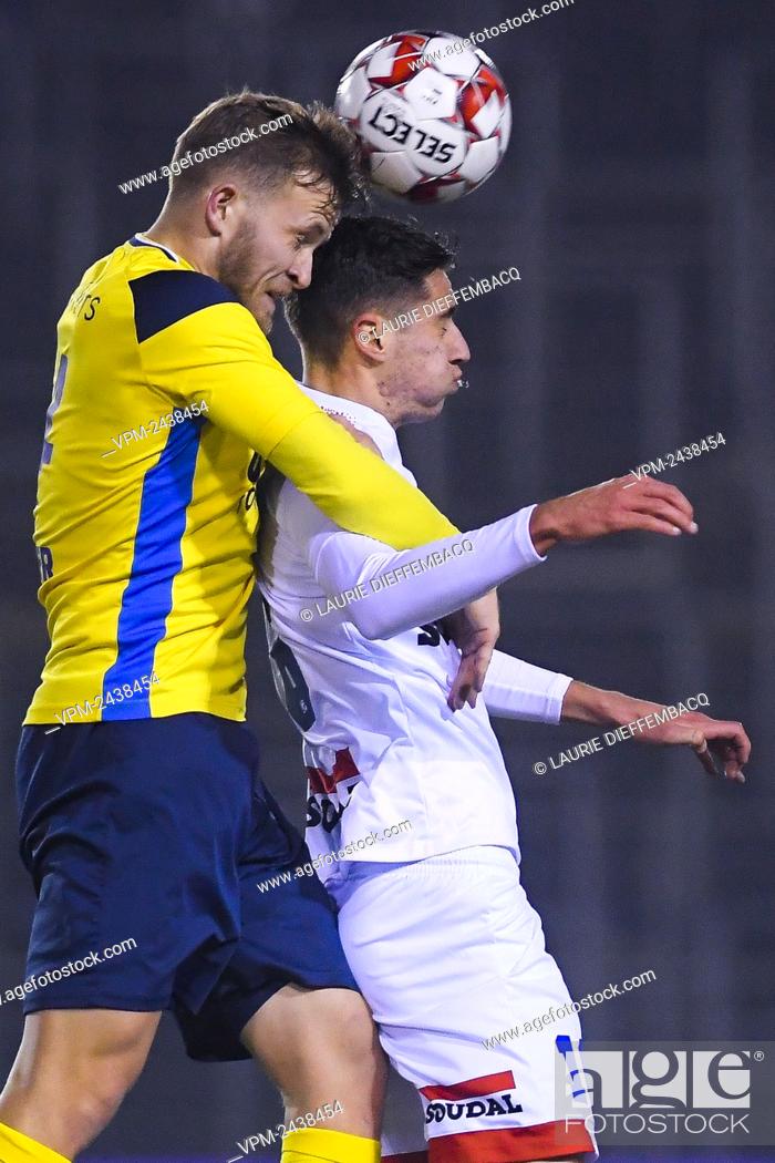 Stock Photo: Westerlo's Kyan Vaesen and Union's Jonas Bager fight for the ball during a soccer game between Royale Union Saint-Gilloise (1b) and Westerlo (1b).