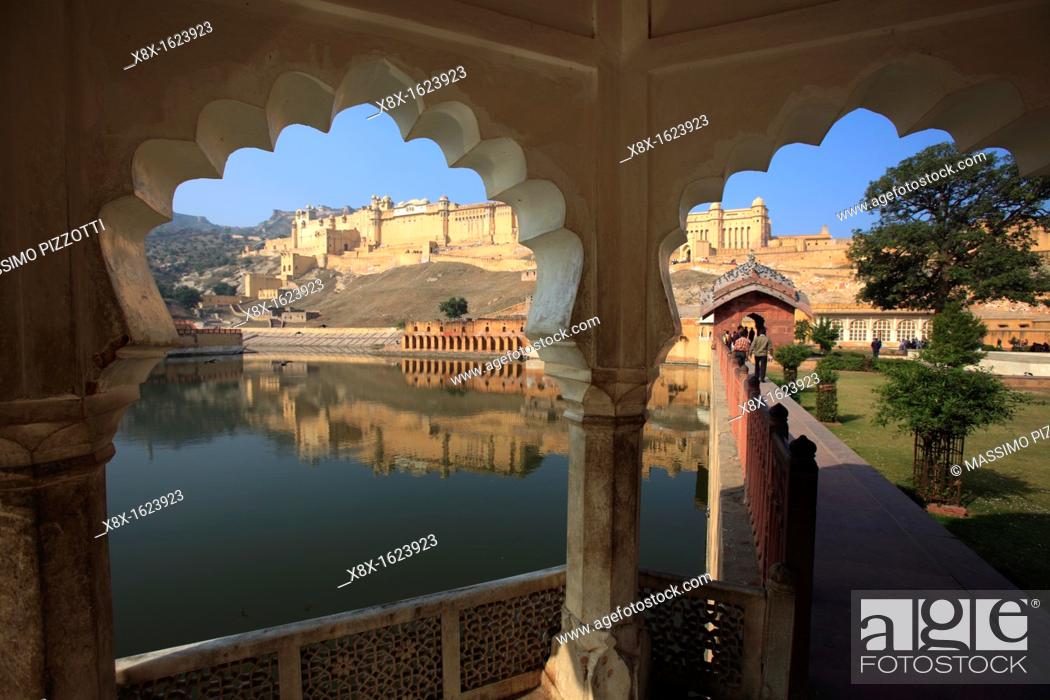 Stock Photo: The Amber Fort reflected in the Maotha lake, Jaipur, India.