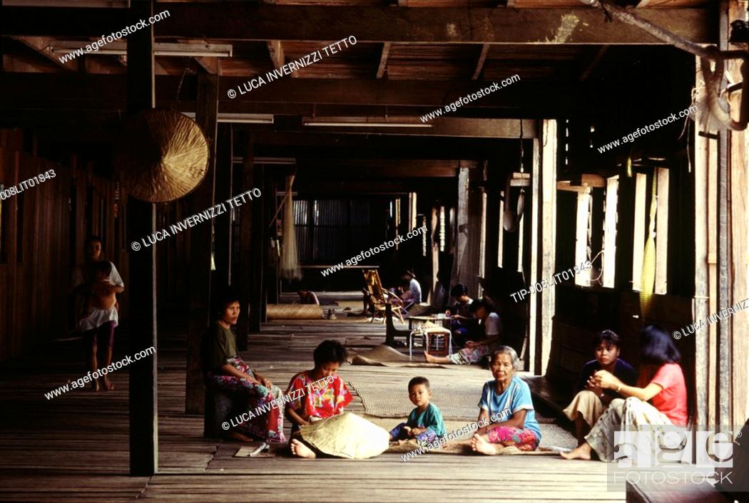 Stock Photo: Interior of a Iban Dayak longhouse, Sarawak, Malaysia.