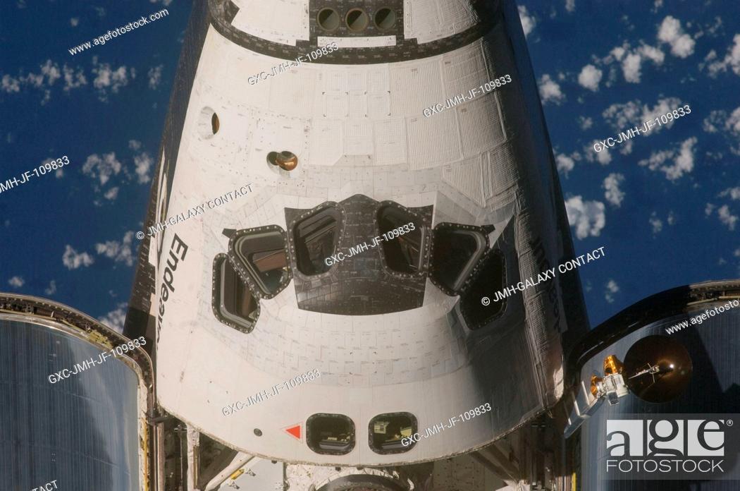 Stock Photo: This view of the crew cabin of the Space Shuttle Endeavour was provided by an Expedition 20 crewmember during a survey of the approaching vehicle prior to.